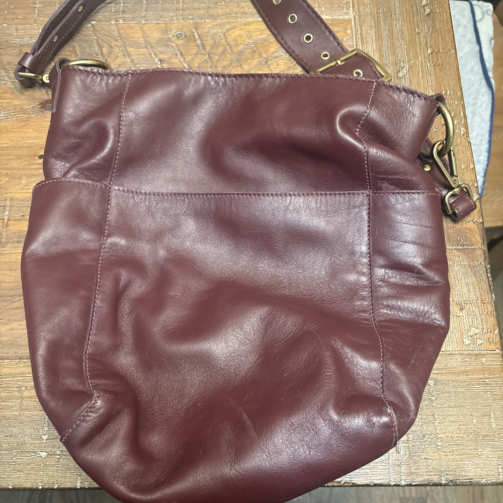 Roots leather purse